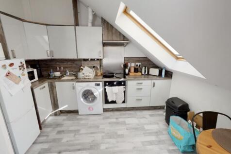 Bright and functional kitchen with ample counte...