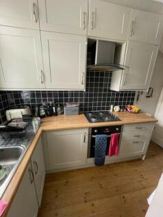 A well-maintained kitchen with modern appliance...