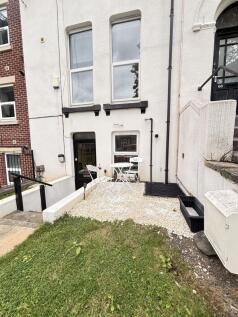 A tidy and welcoming front exterior of a reside...