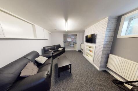 Bright and spacious living room with modern fur...