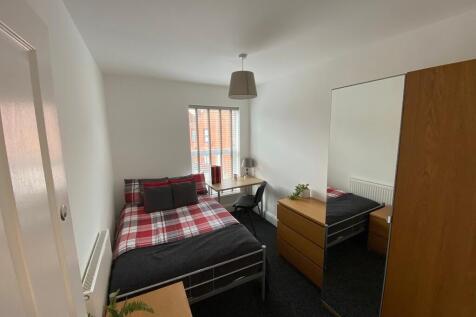 Bright, neatly presented bedroom with a double ...