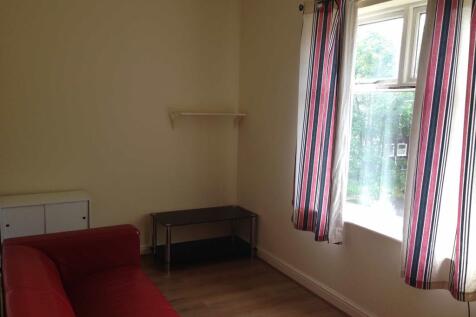 Bright and inviting living room with a large wi...