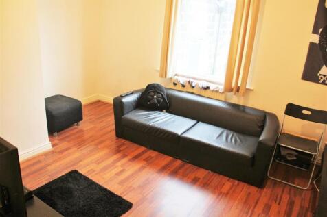 Bright and welcoming living room featuring a bl...