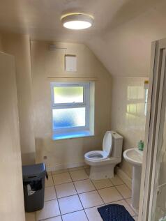 A clean and functional bathroom featuring a WC,...