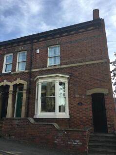 Attractive red-brick period terrace with a bay ...