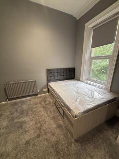 Bright, well-presented bedroom with a comfortab...