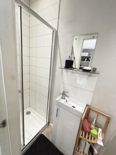 A clean and well-maintained bathroom featuring ...