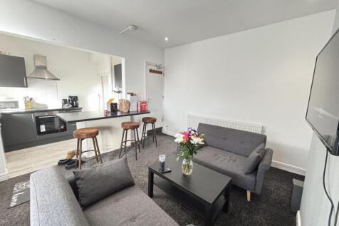 Modern and inviting living room with comfortabl...