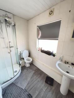 A clean and well-maintained bathroom featuring ...