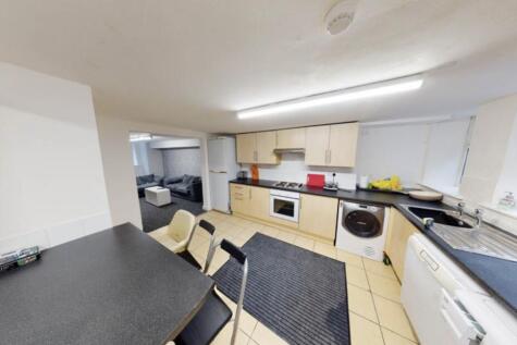 Bright and functional kitchen area with ample w...