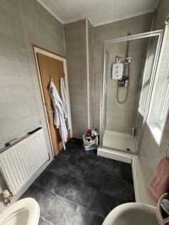 A clean and well-maintained bathroom with a mod...