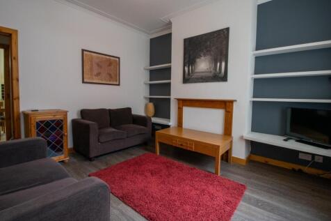 Cozy furnished living room with comfortable sof...