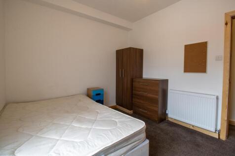 Simple furnished bedroom with a double mattress...