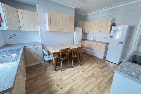 Bright and spacious kitchen with ample natural ...