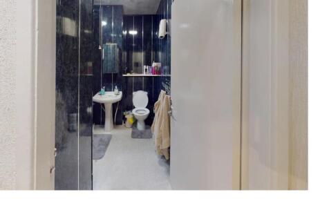 A clean, well-maintained bathroom with a spacio...