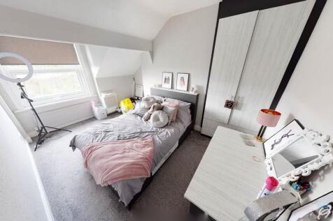 A clean and bright small bathroom featuring a W...