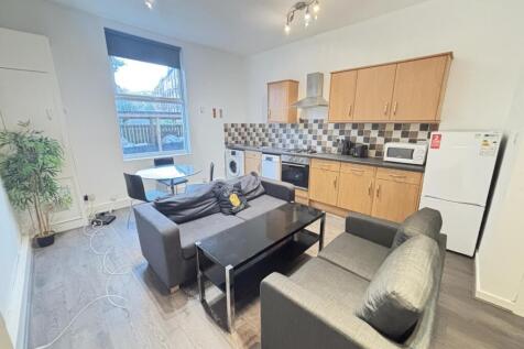 A modern and inviting living room with ample na...