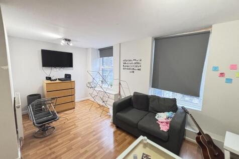 Bright and spacious living room with modern fur...