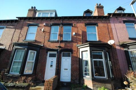 A charming front view of a traditional terraced...