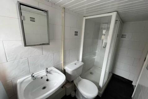 A clean and well-maintained bathroom featuring ...
