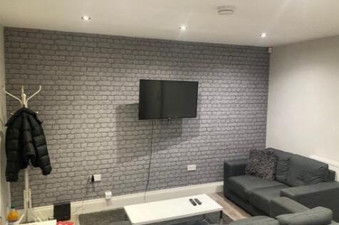 Modern and welcoming living room featuring a co...