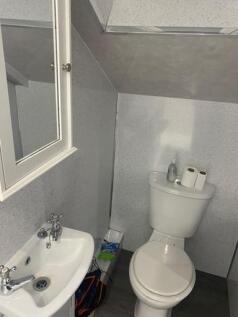 A clean and well-maintained bathroom featuring ...
