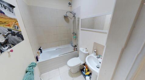 A clean and well-maintained bathroom featuring ...