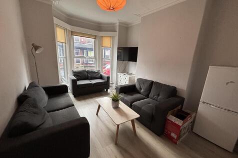 A bright and inviting contemporary living room ...