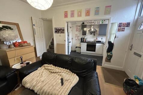 A cozy living room featuring comfortable seatin...