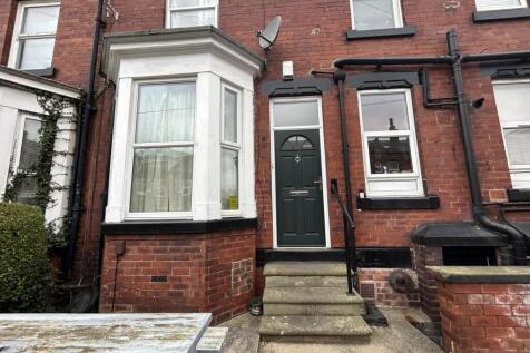 A charming Victorian-style house with a traditi...