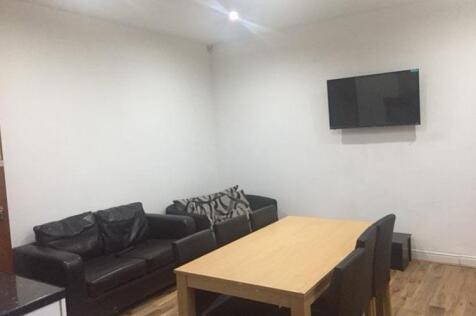 Furnished living room featuring a comfortable b...