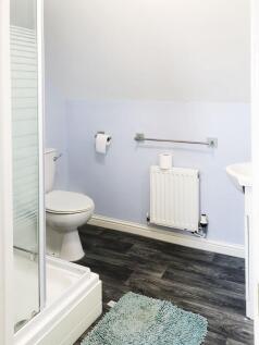 Bright, tidy bathroom with a shower enclosure, ...