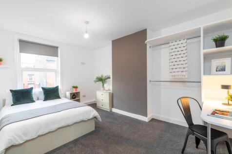Bright, modern double bedroom with large window...