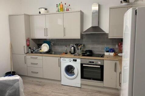 A modern, functional kitchen featuring ample st...