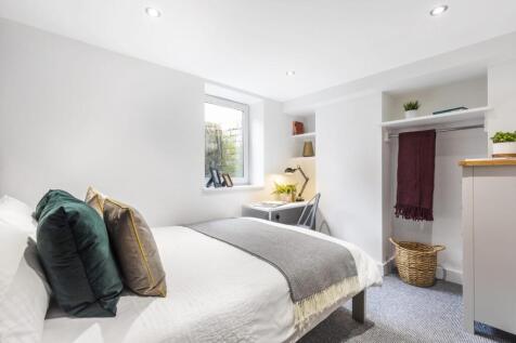 Bright, well-presented bedroom with a comfortab...
