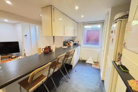 A bright and well-maintained kitchen featuring ...