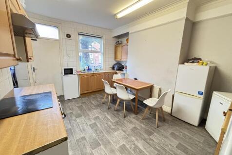 Bright and clean kitchen with ample natural lig...