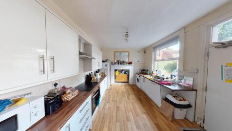 Bright and spacious kitchen with ample counter ...