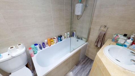 A clean and well-maintained bathroom featuring ...