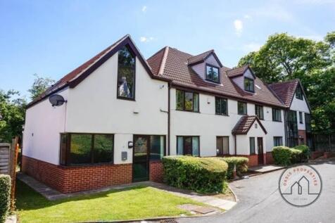 A welcoming exterior shot of a charming residen...