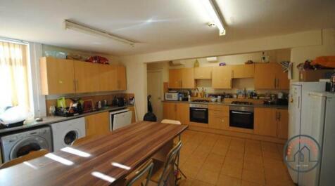 A spacious and well-organized kitchen with ampl...