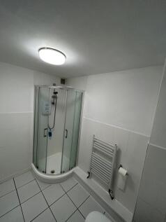 A modern and well-maintained bathroom featuring...