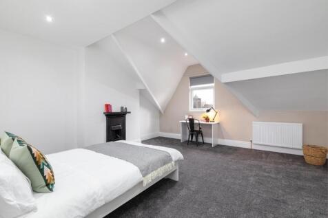 Bright, recently refreshed master bedroom in a ...