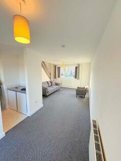 Bright, well-presented living room with neutral...