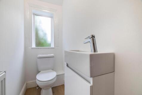 Bright, clean WC with modern fixtures, compact ...