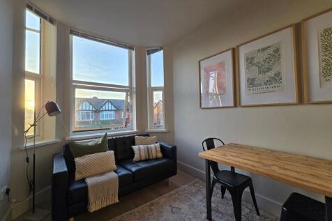 Bright, stylish living area with a comfortable ...