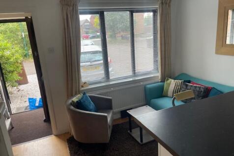 A bright and inviting living room perfect for s...