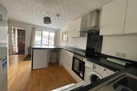 A spacious and modern kitchen, featuring ample ...