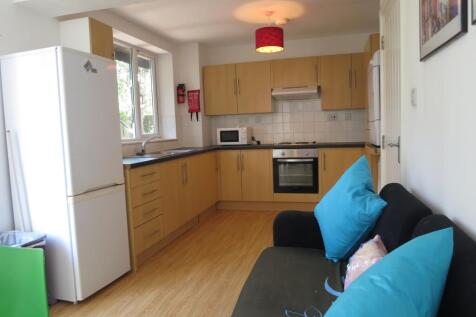 A bright and inviting kitchenette with modern a...