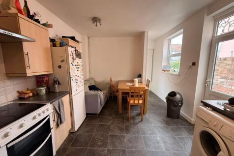 Bright open-plan kitchen/dining area with a fit...